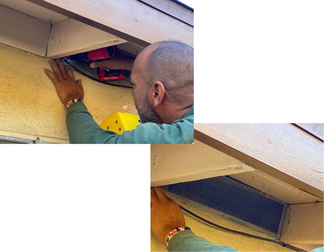 image of a man installing a 1/8th inch screen on a house vent